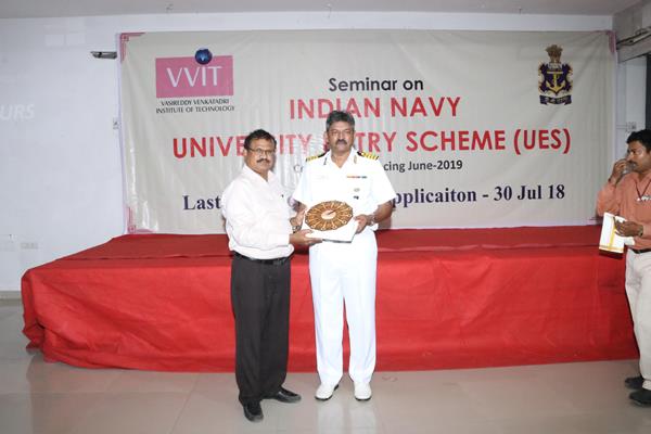 Principal felicitating Captain Indian Navy Pothineni Chandrasekhar